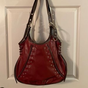 Genna de Rossi burgundy and brown shoulder bag.